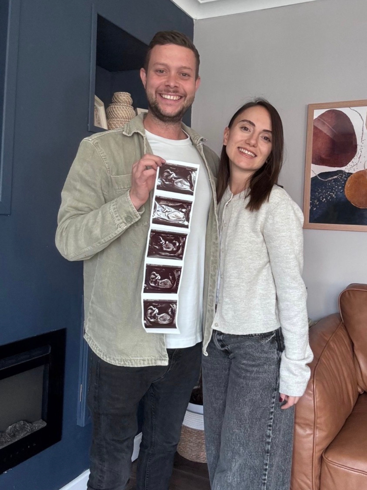 Dan and Merve Gardner with their baby scan pictures